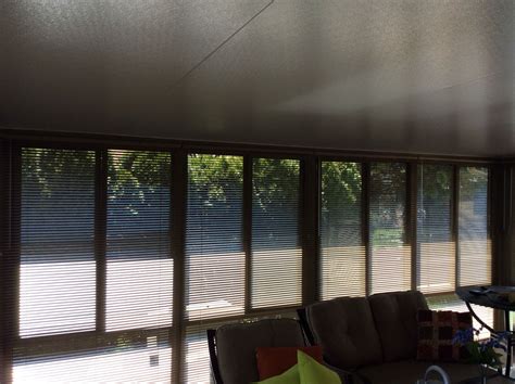 Three Season Sun Room Covered With Aluminum Blinds In Complimentary