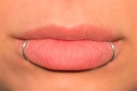 Lip Piercing Snake Bites