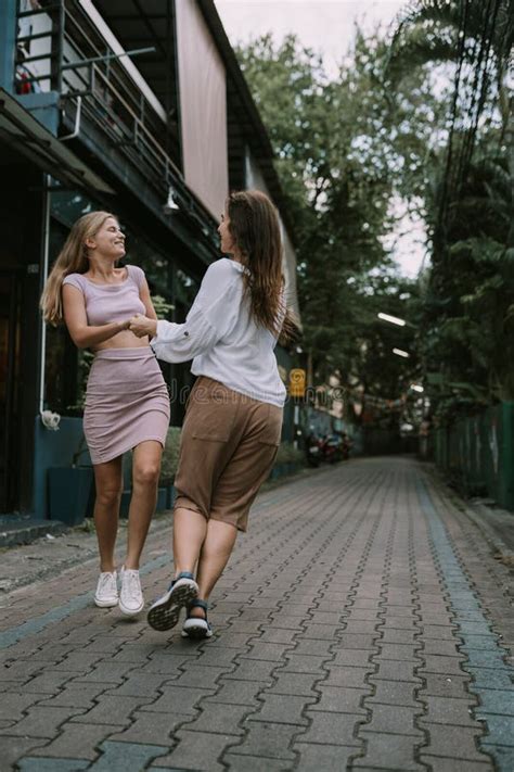 two lesbians having fun on the street stock image image of love chiang 221411957