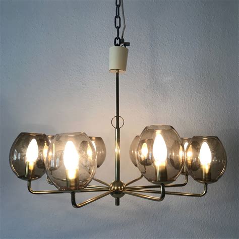 Check out our sputnik ceiling light selection for the very best in unique or custom, handmade pieces from our chandeliers & pendant lights shops. German Sputnik Ceiling Light, 1950s for sale at Pamono
