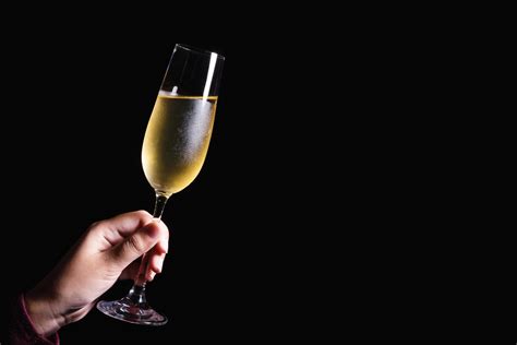 Hand Holding Glass Of Champagne 1241415 Stock Photo At Vecteezy
