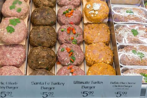 The green dressing that is on the salad and burgers is simply the leftover pesto you will love these simple, delicious burgers. Different turkey burger patties at food bar of Whole Foods ...