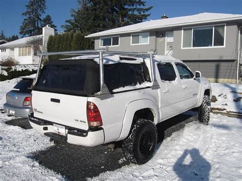Kingdom installed a canopy and thule racks in 2010 on my 1998 ranger. FS: Westcan over canopy rack $500 - Tacoma World Forums