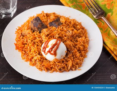 West Africa Rice Jollof With Beef And Boiled Egg Stock Photo Image Of