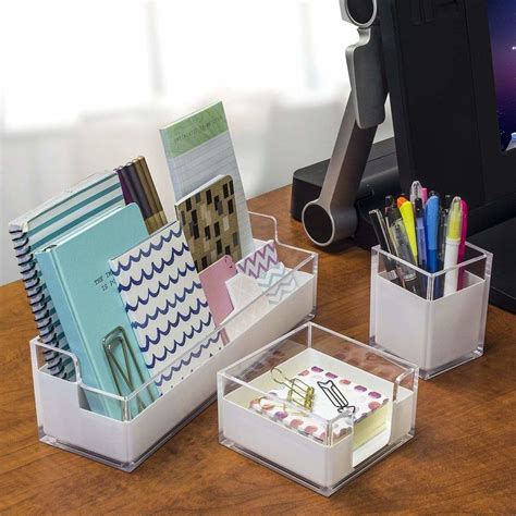 A Set Of Sleek Acrylic Organizers For Keeping All Their Stationery