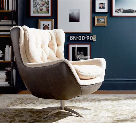 Legs are made of steel with a brushed nickel finish. Wells Tufted Leather Shearling Swivel Armchair | Swivel ...