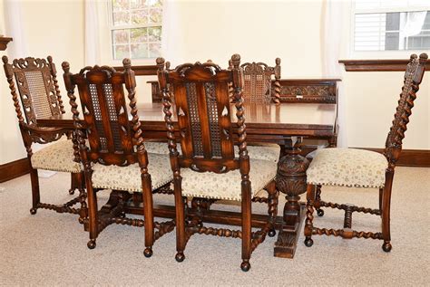 Early 20th Century Jacobean Revival Oak Dining Room Table And Chairs Ebth