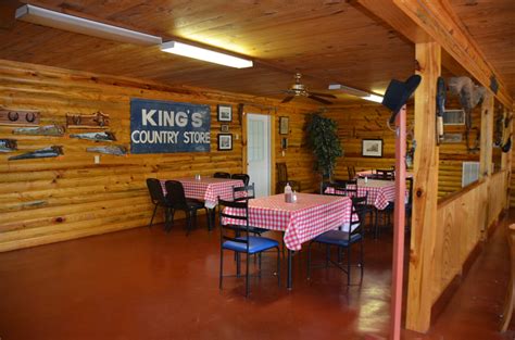 After seeing the sign i walked by some out door tables and saw what had to be the coolest bench i had ever seen. Log Cabin Cafe & Sno Ball Bar! - The Beth Lists