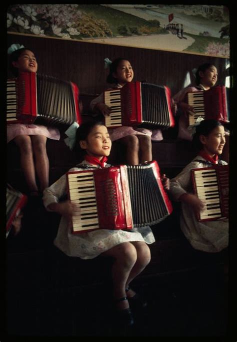 North Korean School Girls Practice Playing Accordions August 1974