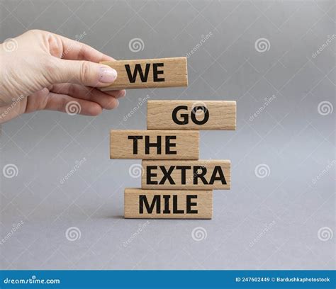 We Go The Extra Mile Symbol Wooden Blocks With Words We Go The Extra