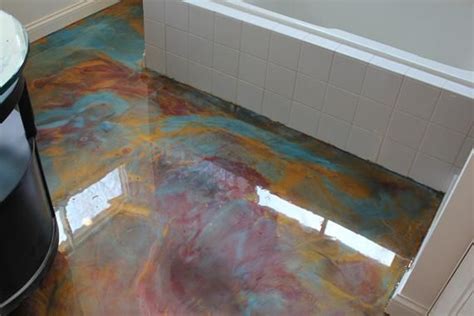 Liquid colorant is available in dozens of colors and is easy to mix; Paint the concrete, the add colorants to epoxy and swirl ...
