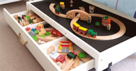Race cars are cool and planes are neat, but have you ever considered a train for your kid's bed. Train table under the bed! Great idea! Takes up less space ...