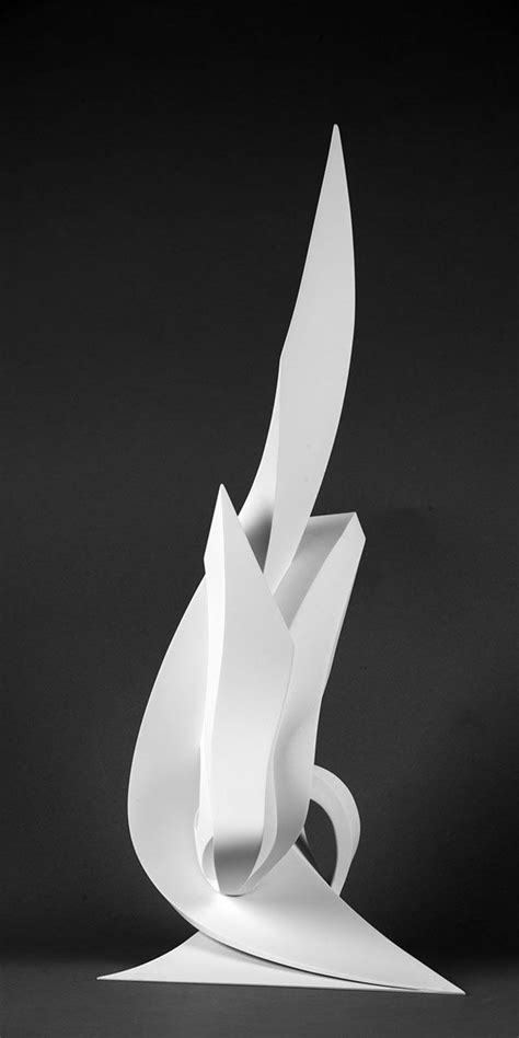 A White Sculpture Sitting On Top Of A Table