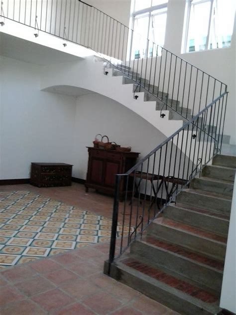 This stairway's soaring paneled wall inspired the stair railing's substantial. Stair Railing Simple Design | Cavitetrail, Glass Railings ...