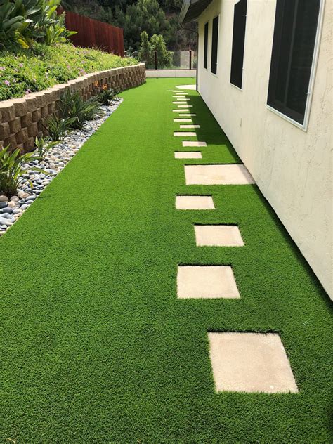 The artificial grass fits seamlessly into our yard. Synthetic Grass & Pavers Installers in San Diego, CA | INSTALL-IT-DIRECT