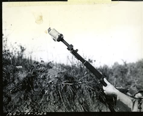 Close Up Of M 1 Rifle With Adaptation Of Chemical Smoke Hand Grenade