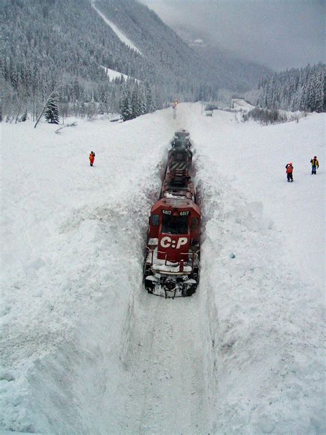 Plowing Through Snow In Rogers Pass Glacier Park Bc Train Winter