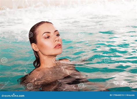 Beautiful Young Woman Swimming In The Pool Portrait Attractive Brunette Girl Stock Image