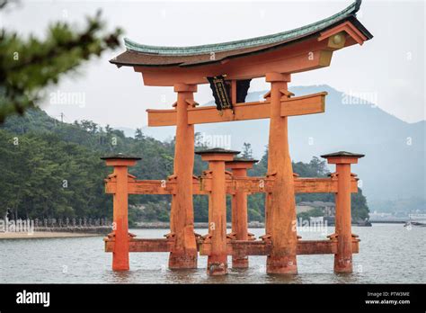 The Itsukushima Jinja Shrine Floating Torii Gate Off The Coast Of The