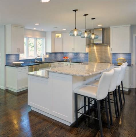 Most typical islands that are used for seating and eating are 42 inches. Kitchen Island Design Ideas - quinju.com