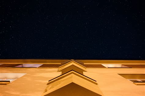 Building Under Starry Sky · Free Stock Photo
