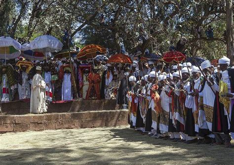 Priests Carrying Some Covered Tabots On Their Heads During Timkat