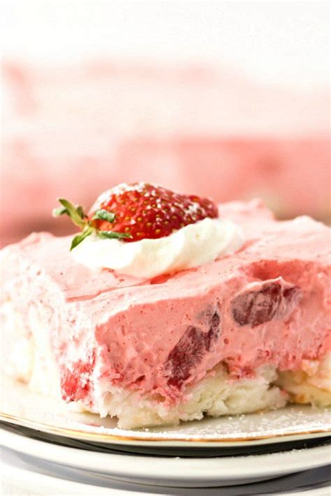 Dish coated with cooking spray; strawberry angel food cake with whip cream and strawberry ...