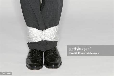 legs tied up photos and premium high res pictures getty images