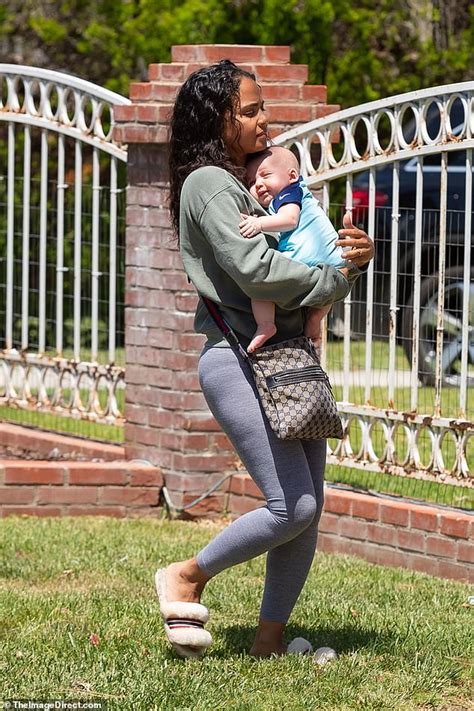 Christina Milian Holds Newborn Son Isaiah During Sunny Family Outing In LA Lipstick Alley