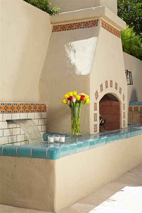 Stucco Fireplace And Water Feature Trimmed With Spanish Tile Hgtv