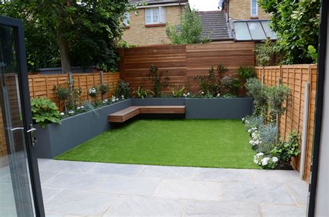 That's why it's good to look for shrubs and trees that max out interest as they grow up, not out. small garden design fake grass low mainteance contempoary design sleek fun london designer ...