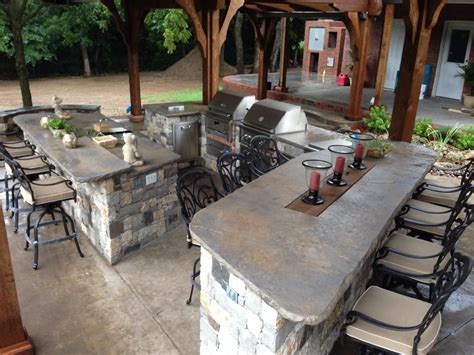 Sip on a pint of n.c. Gorgeous outdoor kitchen with bar seating created by Tulsa ...