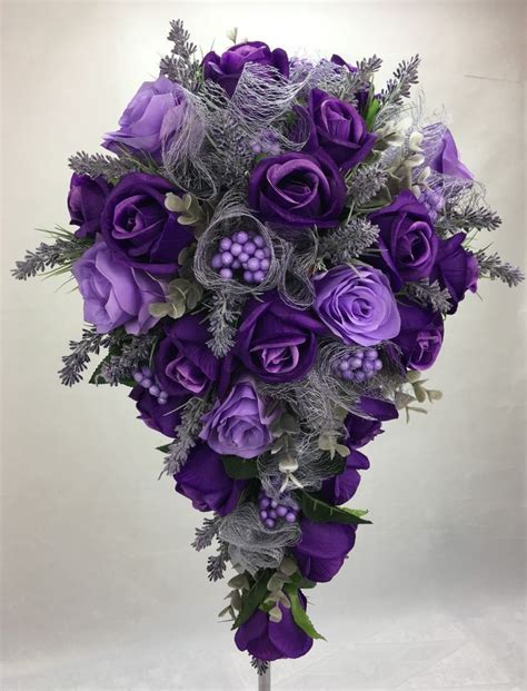 purple silk flowers wedding bouquets silk flower wedding bouquet purple mauve and ivory rose