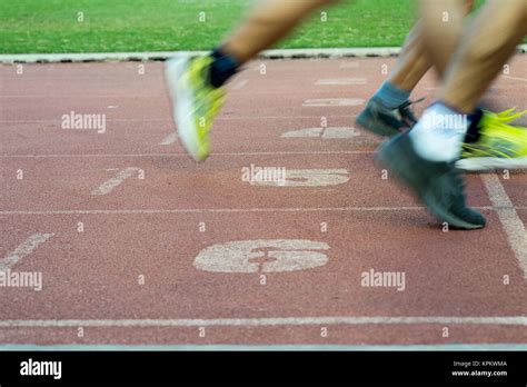 Runners Feet In Motion On Track Stock Photo Alamy