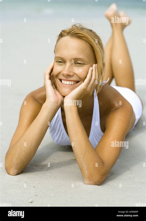 Woman Reclining Beach Smile Hi Res Stock Photography And Images Alamy