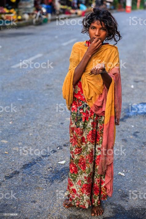 Poor Indian Girl Asking For Help Stock Photo Download Image Now