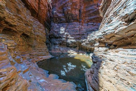 hiking to handrail pool in the weano gorge in karijini national park western australia 16 stock