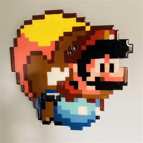 Capped Mario Pixel Art From The Super Nintendo Game Super Mario World