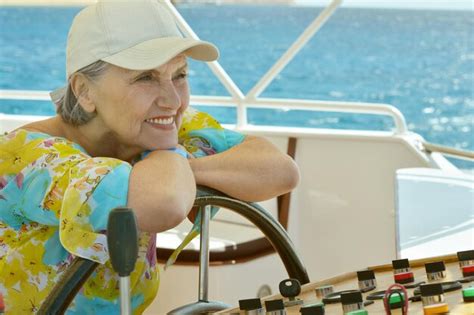 Premium Photo Portrait Of A Beautiful Mature Woman On Yacht
