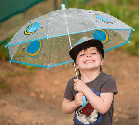 Little Boy Under Umbrella Stock Image Image Of Heavyrain 93824183