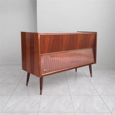 A functional cabinet that can turn your space into warm cozy stereophonic dreamland? grundig majestic MID CENTURY modern 1960s stereo console ...