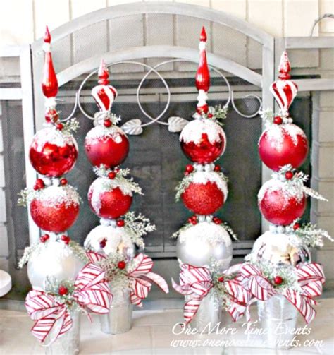 Decorate your topiaries by tying colourful ribbon and adding a bow around the lip of the planter. Christmas Topiaries from www.onemoretimeevents.com (With ...