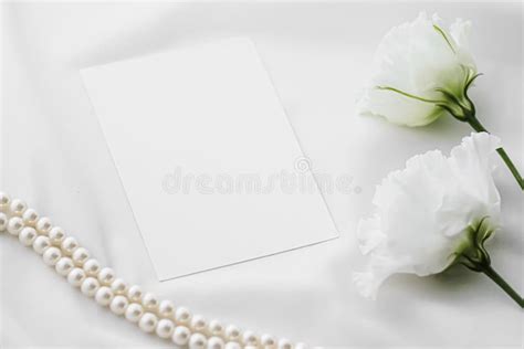 Wedding Invitation White Rose Flowers And Pearls On Silk Fabric As