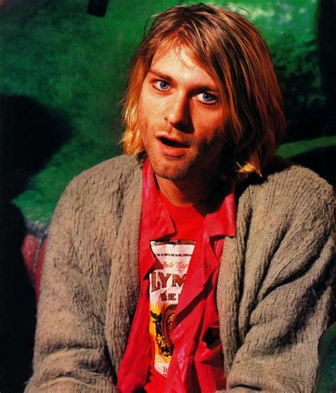 Seeing Red Kurt Cobain Layers A Red Button Down And Graphic T Shirt
