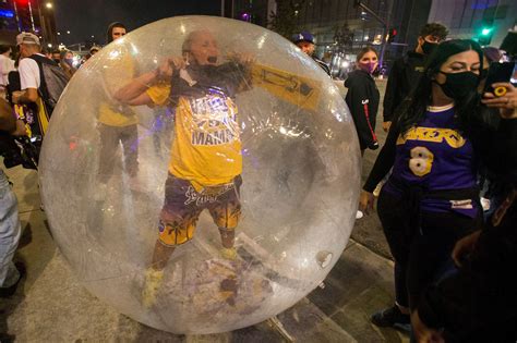 Celebrities such as lil wayne, dwyane wade and shaquille o'neal, who would normally only be caught courtside, mingle among. Lakers fan celebrates NBA title in own weird bubble