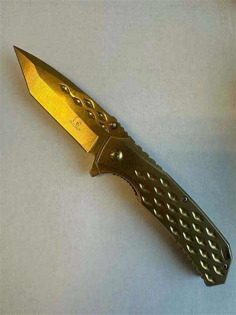 Falcon Spring Assisted Gold Pocket Knife Pacific Solution