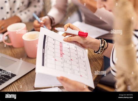 Tender Female Hands Holding Calendar Stock Photo Alamy