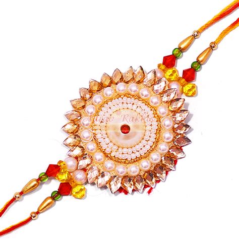 Sparkling Golden Drop Stone Studded Pearl Rakhi Buy Online Fancy Rakhi