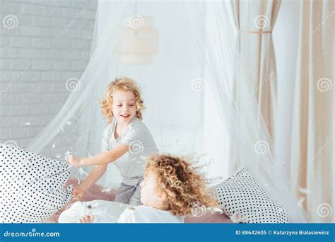 pillow fight pajama party evening time for fun sleepover party ideas girls happy best friends