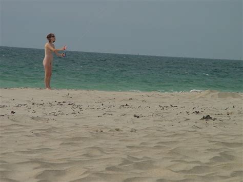 Sex Natural Redhead Girlfriend Naked At The Public Beach Image